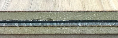 A hardwood face with an SPC core.