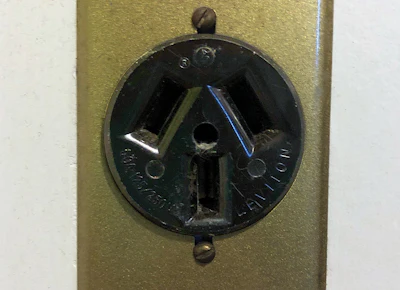 A dryer outlet with the pre-1996 3-wire configuration.