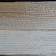Pulling up some boards revealed the wrong trowel had been used, with not enough adhesive transfer.