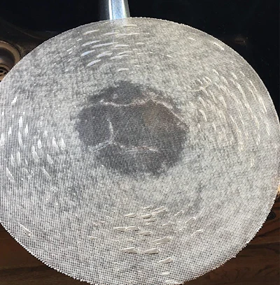 Trying to screen a floor that has been maintained with oil soaps gums up the screen like this. (Photo courtesy of Justin Ball)