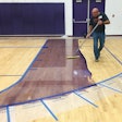With the newer technology in the gym coating business, we were able to add color without painting the floor during this recoat.