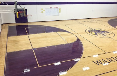 The final result: a vibrant purple achieved solely by recoating the floor.