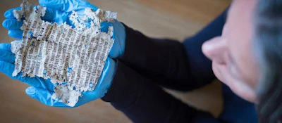 Fragments of a 15th-century illuminated manuscript discovered under floorboards. National Trust Photo