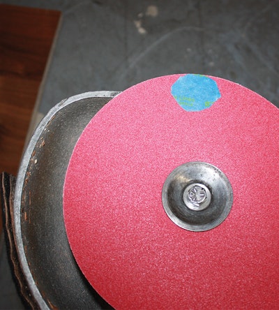 The cutting area on an edger is only about the size of the blue tape you see here—about the size of a quarter.