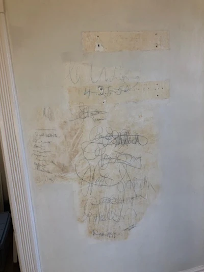 The contractor signatures discovered under wallpaper dated back to 1901.