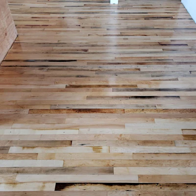 The final product, given a sealer and three coats of satin finish, preserved the maple's rustic character while also giving it a second life.