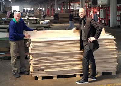Greg Wagner (left) and Mark Casper of Hallmark Floors at the Hallmark factory in Dalian, China.