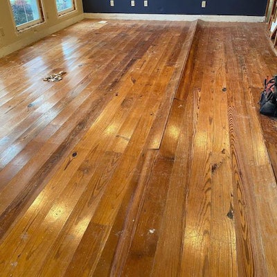 Brain Kelley of Troy, Texas-based Kelley’s Wood Floors shared images of a water-damaged antique heart pine floor, a victim of frozen pipes in a home impacted by the blizzard.