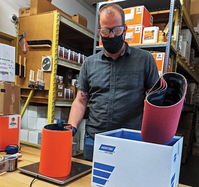 Here's Sales Associate Jamie Pilkey packing a new online order; we're able to weigh and ship all our orders right from our Toronto warehouse.