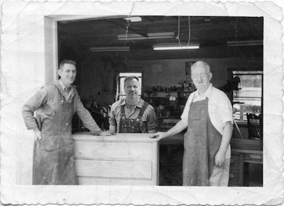 Joseph A. Raymond (at right) and son Robert “Bobby” Raymond (left). I never met my grandfather, so a few years ago I combined my wood shop photo with his! Later, this popular form of woodworker’s apparel would become known as “Brickman Casual.”