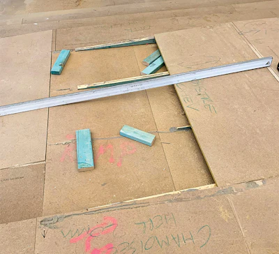 As you can see, we found inadequacy in the 'flatness' of the delivered platform. We knew that if we were going to deliver on the standards we expected for this installation, the subfloor would have to be, basically, perfect.
