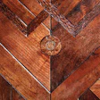For this special project, Custom Floors Unlimited embedded gold coins that dated back to the year the Palace of Versailles was built.