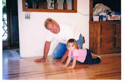 Roy Reichow and his granddaughter Mackenzie during Reichow's contracting days.
