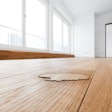 The simple test of a capful of water on a floor can help indicate if it's safe to recoat.