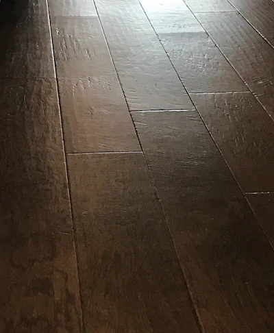 End lift is one problem that can result in engineered flooring exposed to prolonged high humidity.