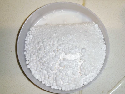 Usually the granules in the calcium chloride test look the same after testing, and only a scale can determine any difference, but on this job the moisture was so high (between 10 and almost 13 pounds) they were semi-liquified. (Photo courtesy of Angelo DeSanto)