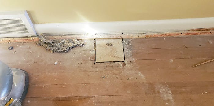 Once you pull carpeting up, you can find complications the homeowners didn’t know about, like this plywood from where a wall was removed.