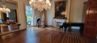 Scraps of antique flooring left over from jobs are now being crafted into Christmas trees by Washington, D.C.-based Universal Floors. This one is at the Decatur House, home to the White House Historical Association.