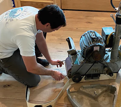 It takes skill to put the abrasive on a drum machine the right way.