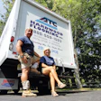 Gary Horvath, wearing his typical work uniform of T-shirt, shorts and Asics volleyball knee pads, and wife Lisa Horvath.