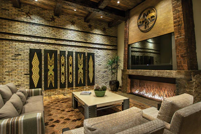 The wood in the family room gives the home a rugged appeal right out of the American frontier.