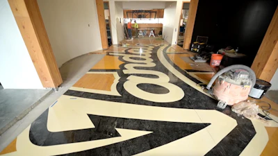 The arena's older court was reclaimed and installed elsewhere in the new facility.