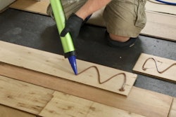Adhesive used with any wood flooring should be elastomeric, which allows it to move with the wood as it shrinks and swells with changes in relative humidity.