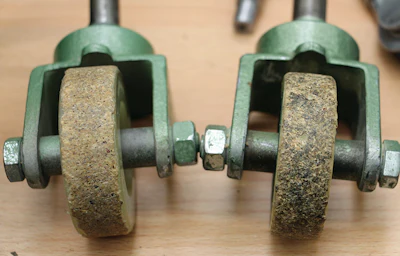 These wheels show wear from being rolled over rough surfaces like driveways and sidewalks. Any debris stuck in the wheels will transfer right to the floor. Good contractors never let their wheels hit any surface but the wood floor.