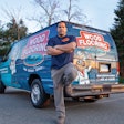 Felix Roman of Wood Flooring Doctor with his work van, which won Best Exterior Graphics in the 2022 WFB Truck & Van Contest.