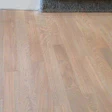 Gray stain on a white oak floor with water-based finish is a tricky job—but not impossible.
