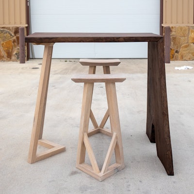 'The Old Fashioned' Bar Table is a continuous grain bar-height piece made from a walnut slab.