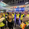 The Nantucket Cares team in the Warsaw train station. 'We relocated 100 families that day and provided food and transportation to other countries inside the E.U.,' Yates said.