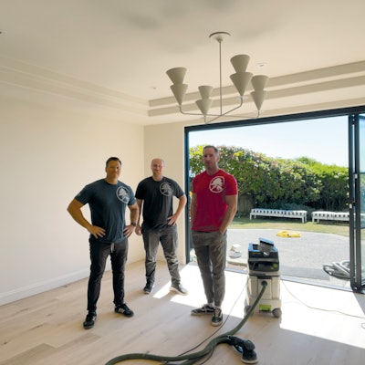 I make a conscious effort to create a work experience for my employees that is drastically different from the one I started in. That’s me on the left with my employees Kevin Huff in black and Dale Merriam in red.