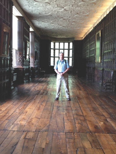 Michael Purser stands in the Long Gallery in Aston Hall, the original home of Sir Thomas Holte, a baron, located in Birmingham, England.