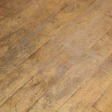 Gray areas where finish has completely worn off the floor
