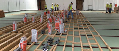 A total of 34,000 square feet of flooring was installed in the addition, most of it over this sleeper system.
