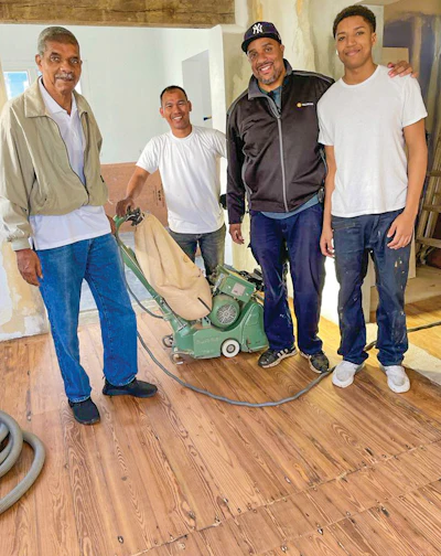 Damon Taylor II, 18, pictured far right, is the latest addition to the Taylor family flooring dynasty in Bermuda.