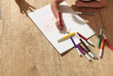 Made of oak, Mafi's CNC-cut Carving Kids flooring is designed to be colored with crayons or markers.