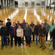 The working group for what is now the Indoor Sports Surfaces Division of the American Sports Builders Association at the Praters facility in Chattanooga, Tenn., in January included (from left): Tim Young, Basic Coatings; Ashton Salinger, Basic Coatings; McKenzie Nelson, Western Sport Floors; John Prater, Praters; Paul Nelson, Western Sport Floors; Rob Zehnder, PoloPlaz; Steve Yoder, The Ohio Floor Company; Cassie Wilson, Praters; Larry Wade, The Ohio Floor Company; Abby Mitchell, Ponder Company; Kevin Miller, The Ohio Floor Company; Paul Hildebrandt, Creative Floors; Jay Hendley, Covington Floors; Logan Allen, Allen Hardwood Floors; Mike Allen, Allen Hardwood Floors; and Phil Sanchez, Bona.