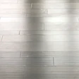 A 16-gauge staple was used on this 1/2-inch-thick engineered floor, causing the dimples you see.