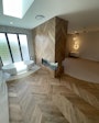 The floor and walls of this new build in Australia featured prefinished European oak.