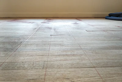 Once the field is filled in, we snap our lines (above) showing where the topnails will go (below).