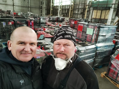 Here I am in the Berdychiv, Ukraine, area with Andrey Ivanov and the donated generators delivered and stored in preparation for service and distribution. Ivanov is the manager for the generator service center.