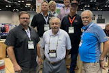 Janet Sullivan, back left, pictured with fellow former NOFMA school instructors Diana Gurley; (middle row, left to right) Keith Waldrop and Daniel Boone; and (front row, left to right) Wayne Lee, Don Connor and Bob Moffett at the 2021 NWFA Expo in Orlando.