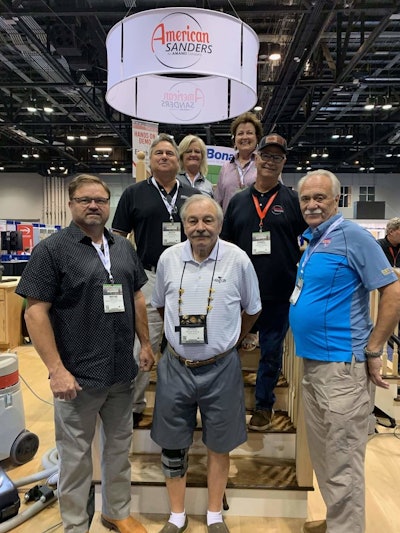 Janet Sullivan, back left, pictured with fellow former NOFMA school instructors Diana Gurley; (middle row, left to right) Keith Waldrop and Daniel Boone; and (front row, left to right) Wayne Lee, Don Connor and Bob Moffett at the 2021 NWFA Expo in Orlando.