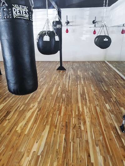 Marca Madera installed this teak floor in a boxing gym in Mexico and finished it with matte Bona Traffic HD.