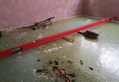 In this case, we were working on what used to be a porch but was now a room addition. Because it had been a porch, the floor was canted down for rain runoff.