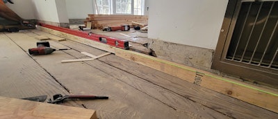 We visualized this as a big floor heater patch, and we started with the rim joists to set the elevation.