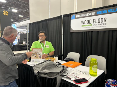 Talking subfloor prep at the WFB booth in the Media Village.