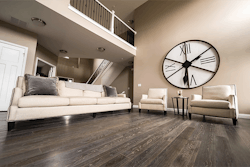 Biophilic design emphasizes the use of natural materials, such as real wood flooring, because they offer many advantages, including improved mental health.